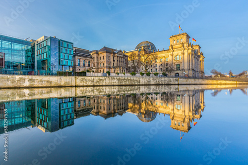 Photography Reichstag with reflection in river Spree