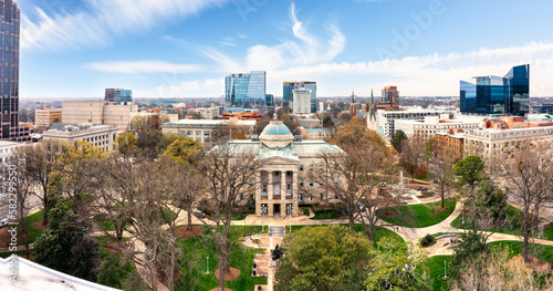 Aerial view of the North Carolina State Capitol and Raleigh skyline