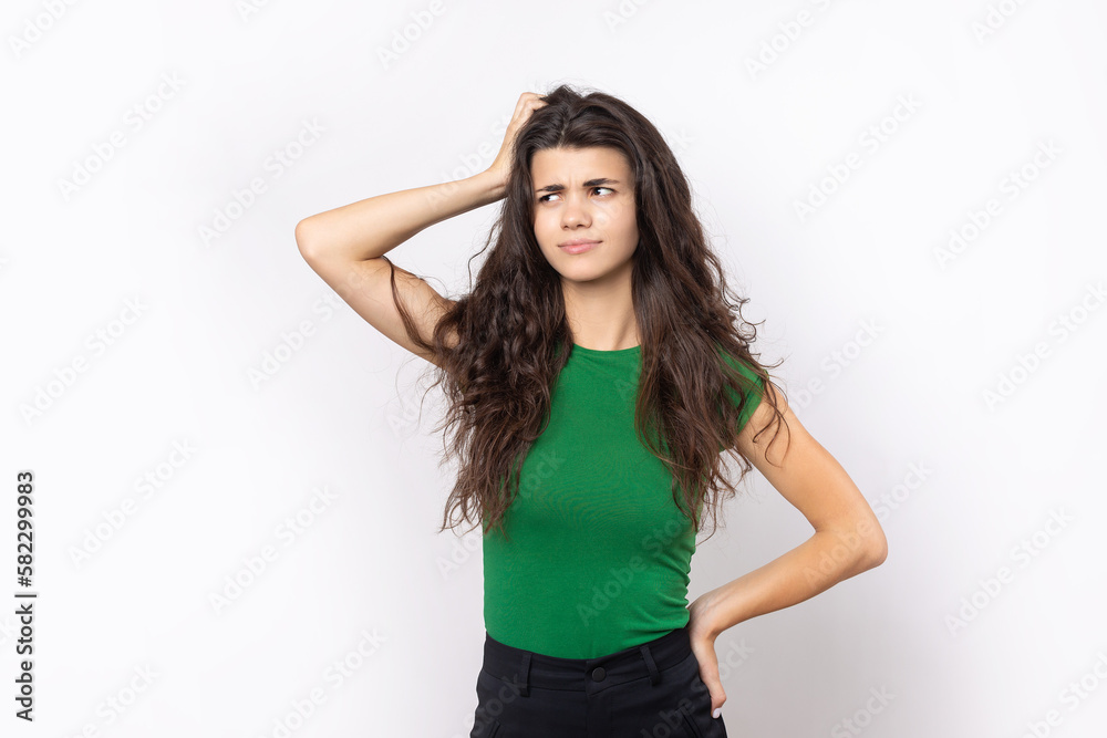 Portrait of a beautiful young woman thinking, isolated on white background Portrait of a beautiful young woman thinking, isolated on white background