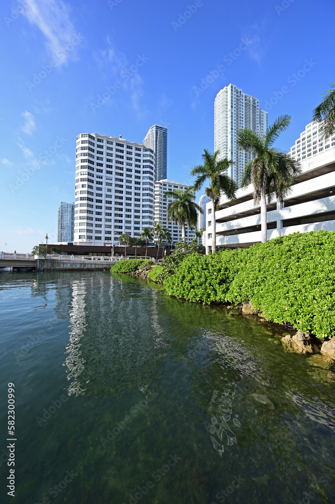 Brickell Bay Walk and surrounding buildings on clear sunny morning in Miami, Florida.