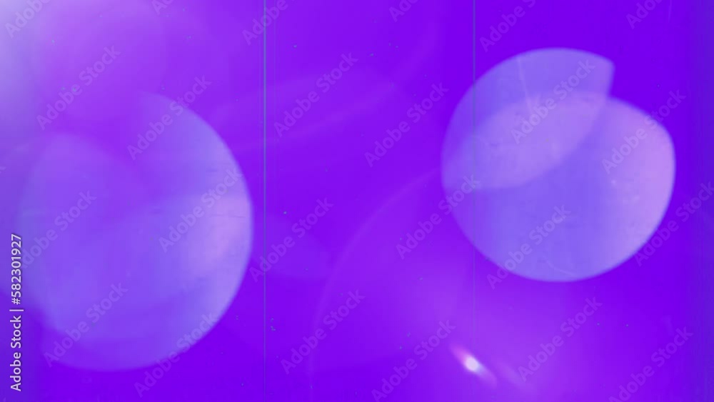 Light leaks, lens flare and bokeh abstract background on purple. Light leaks, lens flare and bokeh abstract background on purple.