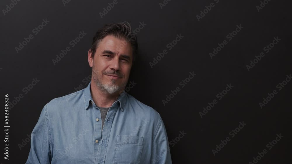 Portrait of mature age, middle age, mid adult man in 50s, happy confident smile. Copyspace. Portrait of mature age, middle age, mid adult man in 50s, happy confident smile. Copyspace.