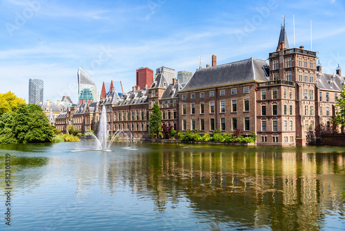 The Hague skyline with Binnenof and the Hofvijver lake in foreground on a sunny summer dfay