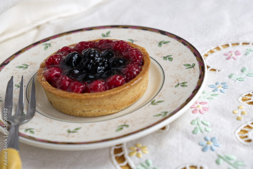 a delicious tart with berries and custard a delicious tart with berries and custard