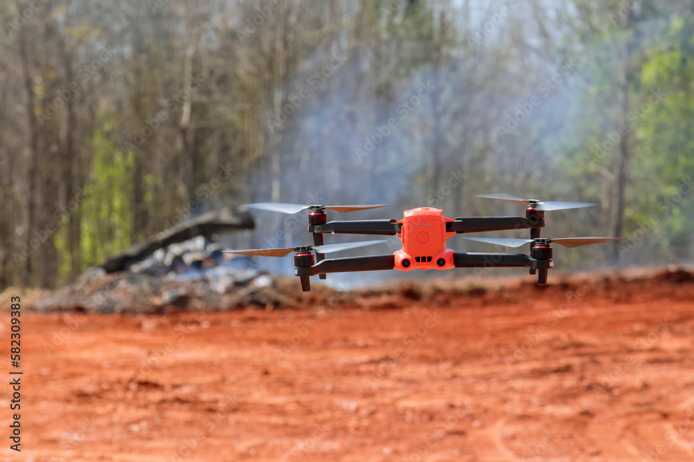 Construction site drone is being controlled by an experienced engineer architect