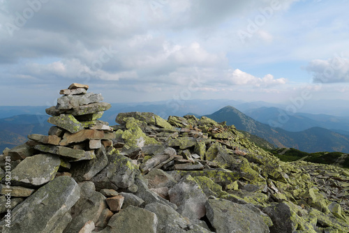 Stones covered with lichen in Gorgany - mountain range in Western Ukraine photo