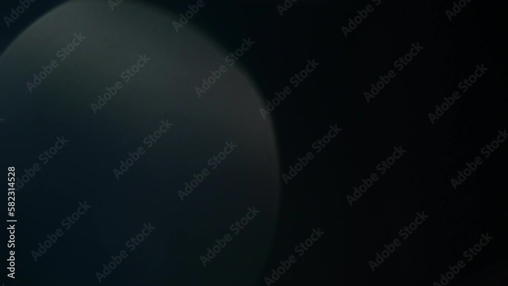 Nice Glowing Of Large Blue Bokeh Lights. Abstract movement of natural large blue defocused circles with light reflexes. Soft bokeh circles abstract moving background, transition or overlay. Nice Glowing Of Large Blue Bokeh Lights. Abstract movement of natural large blue defocused circles with light reflexes. Soft bokeh circles abstract moving background, transition or overlay.