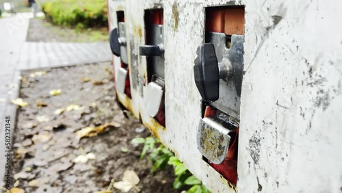 Vintage Chewing Gum Machine on Street