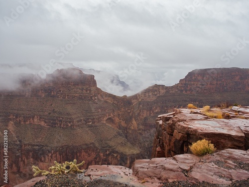 West Rim Grand Canyon Eagle Point on Foggy Day photo