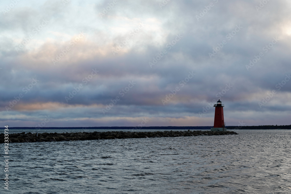 lighthouse and cloudy skies