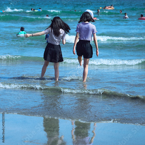 children playing on the beach