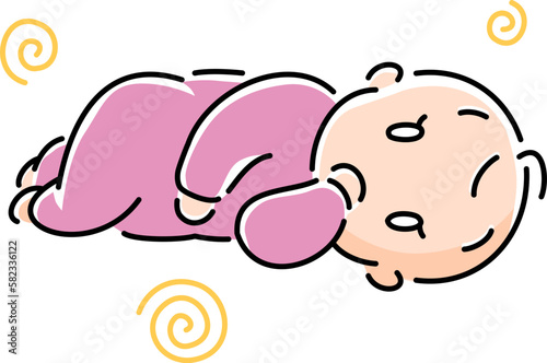 寝転んで手を口に入れている赤ちゃん