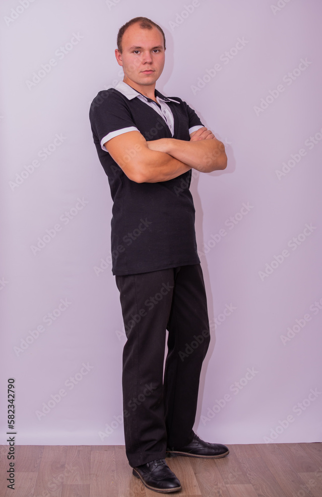 Portrait of a young man in modern fashionable clothes. Portrait of a young man in modern fashionable clothes.