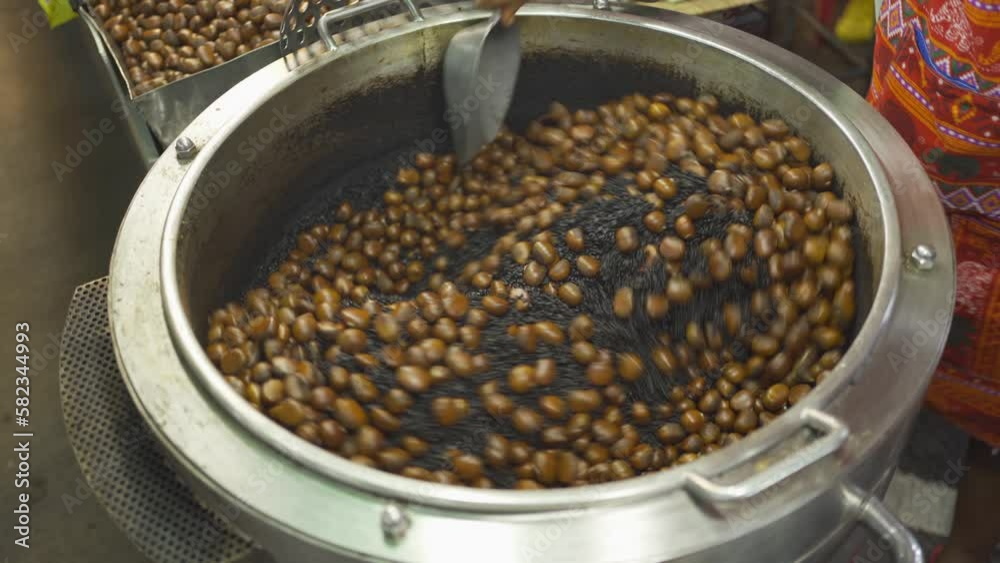Chestnut. Thai street food in temple fair, and night local markets in Bangkok. Asian Retail shops. Travel in Thailand. Chestnut. Thai street food in temple fair, and night local markets in Bangkok. Asian Retail shops. Travel in Thailand.