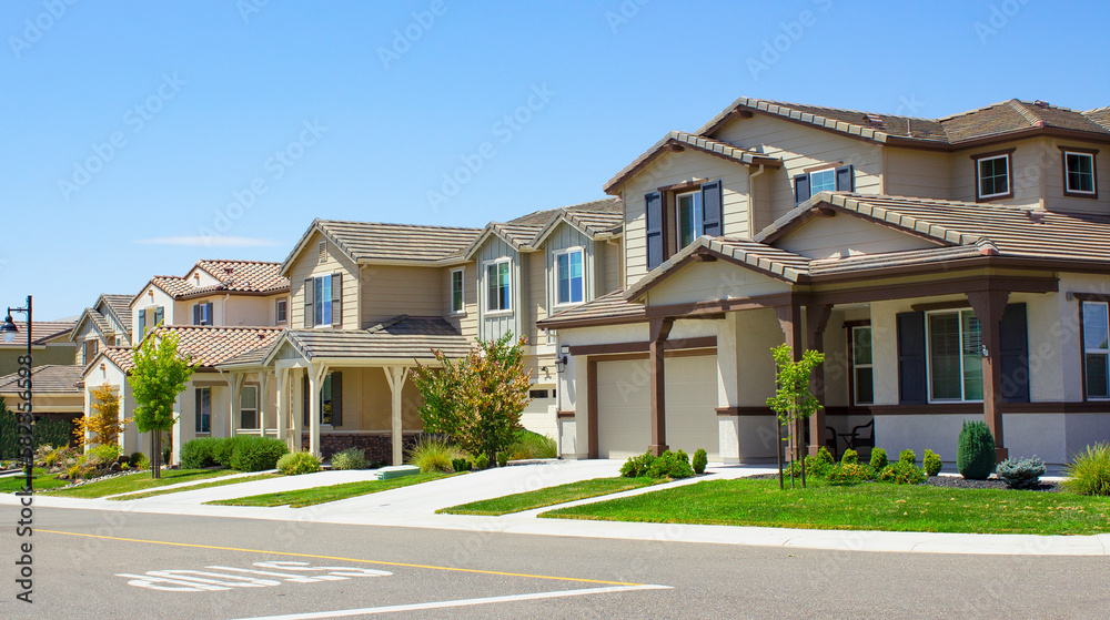 Row of three double story middle class homes in California Row of three double story middle class homes in California
