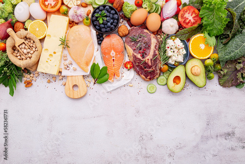 Ketogenic low carbs diet concept. Ingredients for healthy foods selection set up on white concrete background.
