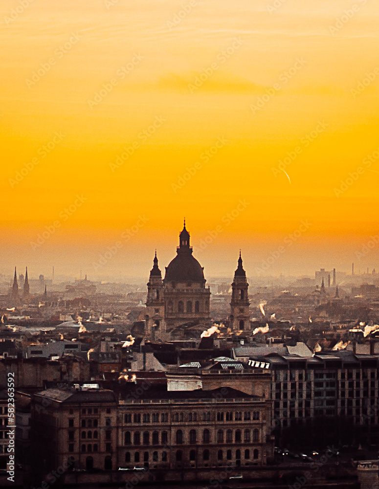 stock photo of view of dome of budapest church at sunrise