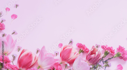 beautiful spring flowers on purple  background