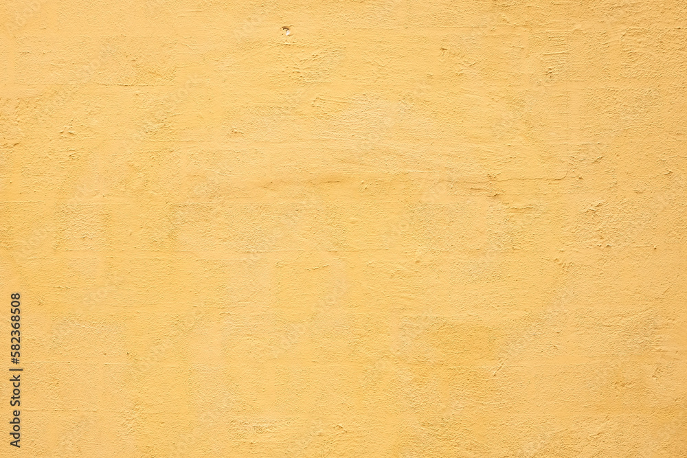 Old yellow concrete block wall background and texture for background. Old yellow concrete block wall background and texture for background.