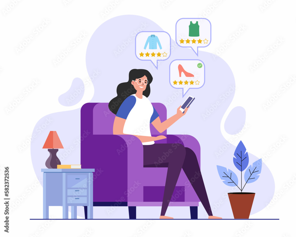 Young woman sitting on a cozy couch with smartphone and purchasing fashion cloths, concept of Online Shopping, Home delivery.