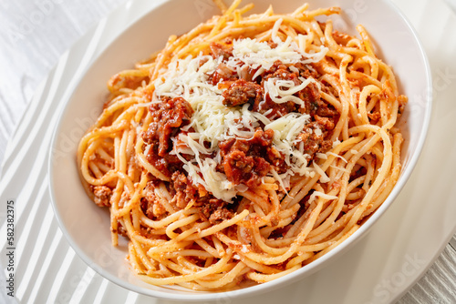spaghetti al ragu alla Bolognese in white bowl photo