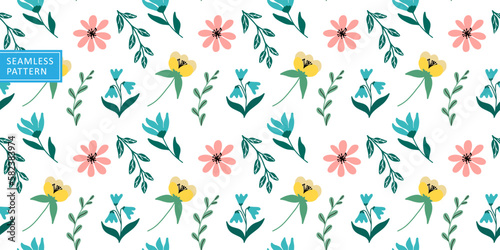 Multicolored cheerful vector seamless pattern with cute flowers, leaves and branches on a white background for textiles, wrapping paper, covers and backgrounds