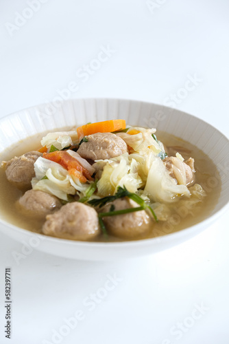 Meatball and vegetables soup in bowl
