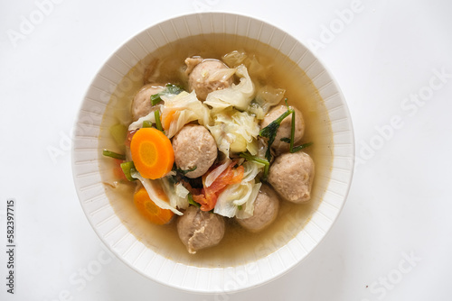 Meatball and vegetables soup in bowl