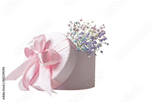 Fototapeta Naklejka Na Ścianę i Meble -   delicate bouquet with pink small flowers in a cardboard box on a light background. View from above. PNG Isolate on white.


