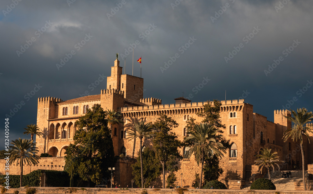 Dramatic late afternoon storm light on The Royal Palace of La Almudaina of Palma Majorca