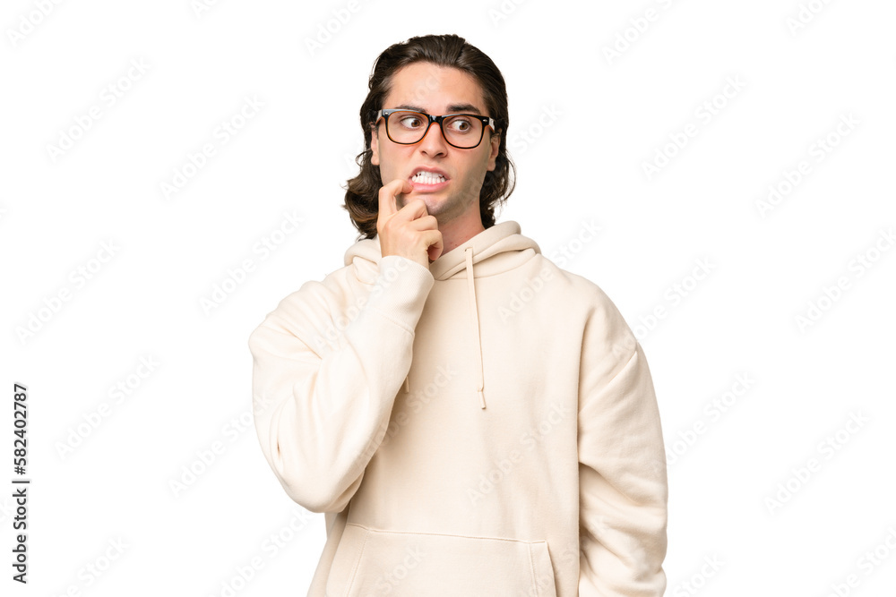 Young caucasian man isolated on green chroma background nervous and scared Young caucasian man isolated on green chroma background nervous and scared
