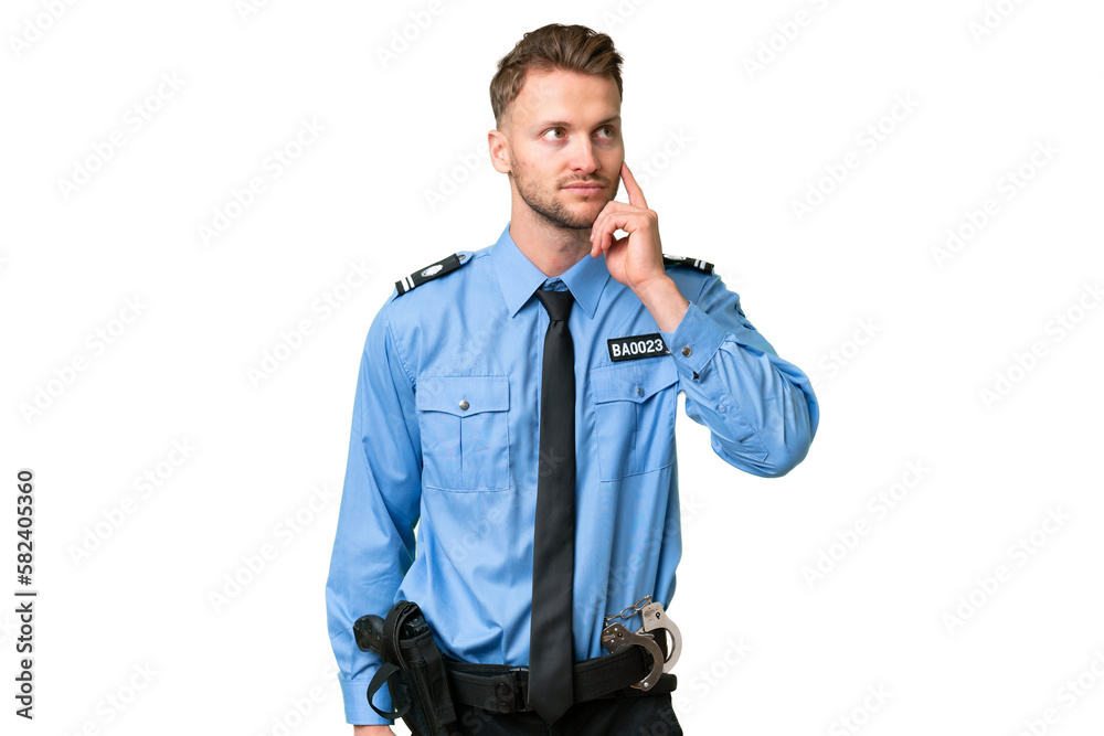 Young police man over isolated background thinking an idea while looking up Young police man over isolated background thinking an idea while looking up