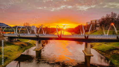 bridge over a river at sunny sunset