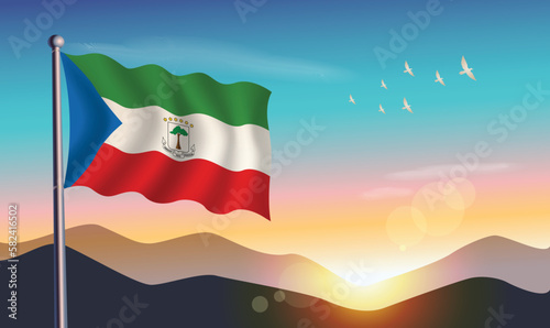 Equatorial Guinea flag with mountains and morning sun in background