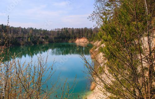 Wonderful colors of the former Cretaceous quarry in Grodno  on the site of which a lake was formed  Industrial facility - artificial reservoir 