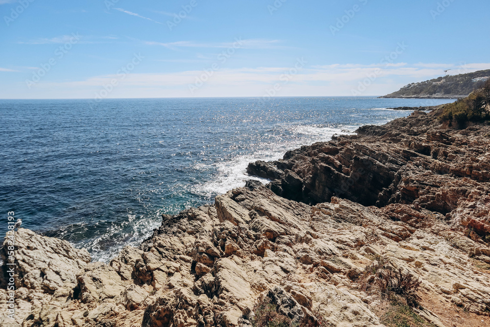 Water's edge on the peninsula of Saint-Jean-Cap-Ferrat on a sunny day