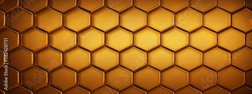 Seamless pattern of honeycomb texture in amber hues, ideal for design and backgrounds.