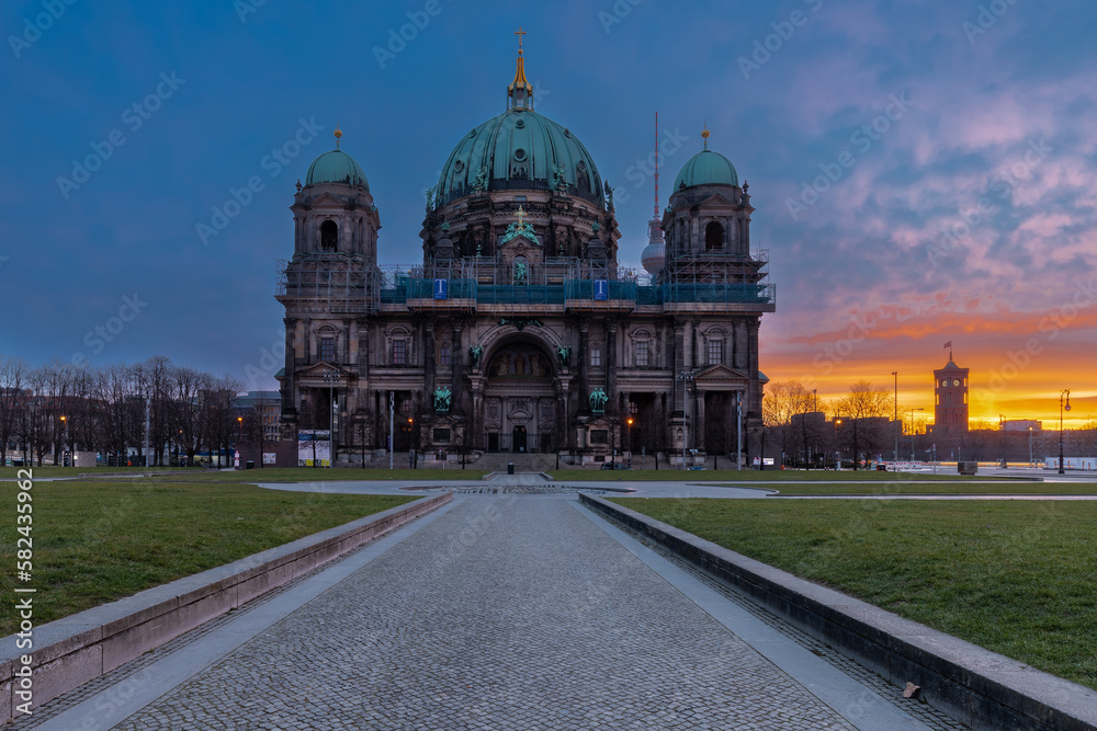Berlin, Germany 03-16-2023 The Berlin Cathedral during a colorful sunrise on the Museum Island in central Berlin is a monumental German Evangelical church and dynastic tomb, built from 1894 to 1905 