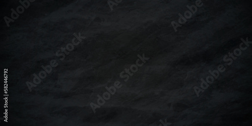Dark black and stone grungy wall backdrop background. Blank black concrete texture surface background. dark texture chalk board and black board background.	