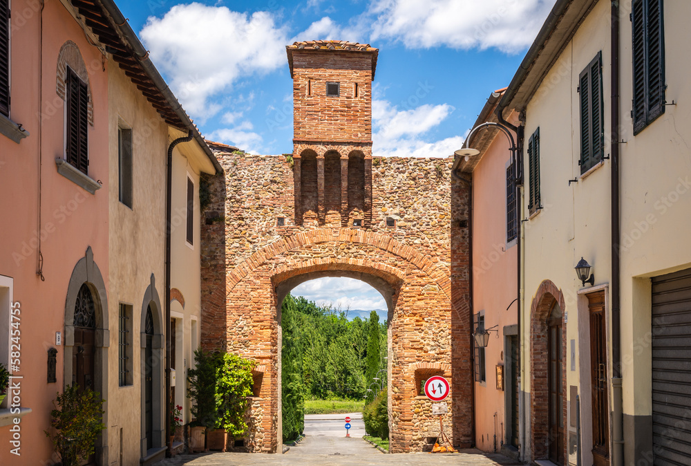 Fototapeta premium the gate of the medieval village of Altopascio (The Mariani gate) - Lucca, Tuscany - on the route of the Via Francigena to Rome