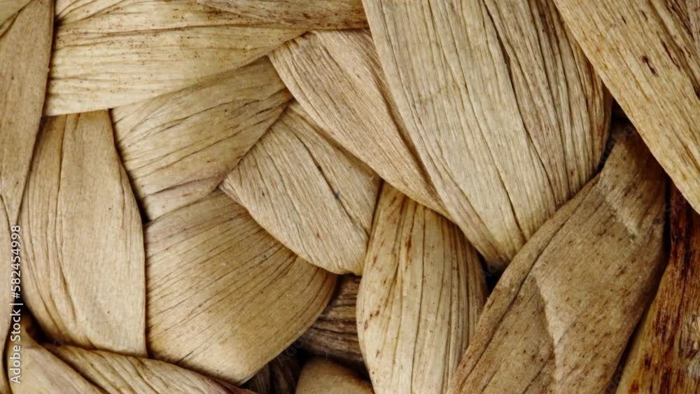 Natural wood texture of a wicker wooden box, close-up view. Close-up shot of weaving made of wood. Rustic wooden background.