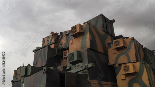 Military metal containers thrown into scrap yard