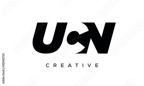 UCN letters negative space logo design. creative typography monogram vector 