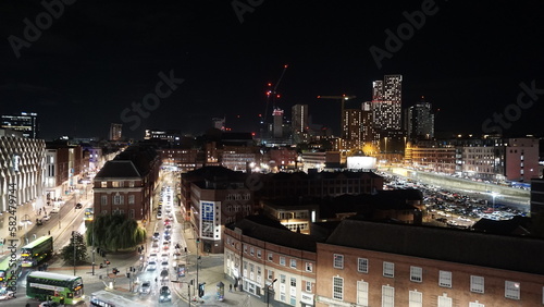 Photo of a generic city urban skyline, with bustling traffic below. This photo is suitable for any construction, real estate and property industries, as well as travel and transport sectors. 
