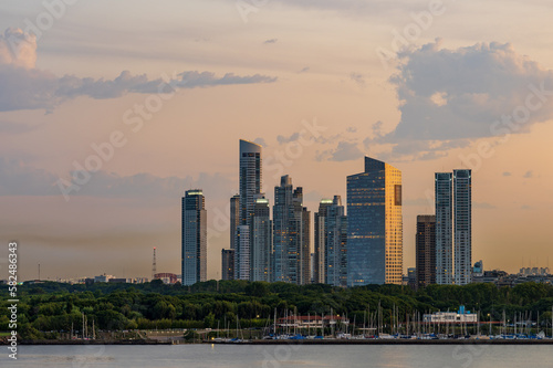 Large modern apartment buildings of Puerto Madero by the shoreline in Buenos Aires Argentina at sunset