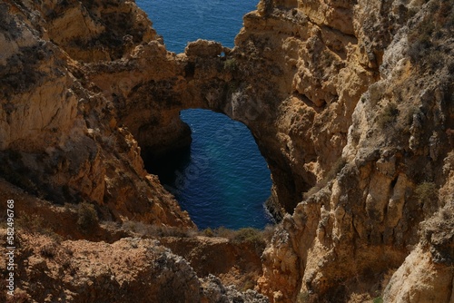 Scenic View of Praia do Camilo beach of blue water in Lagos, Portugal