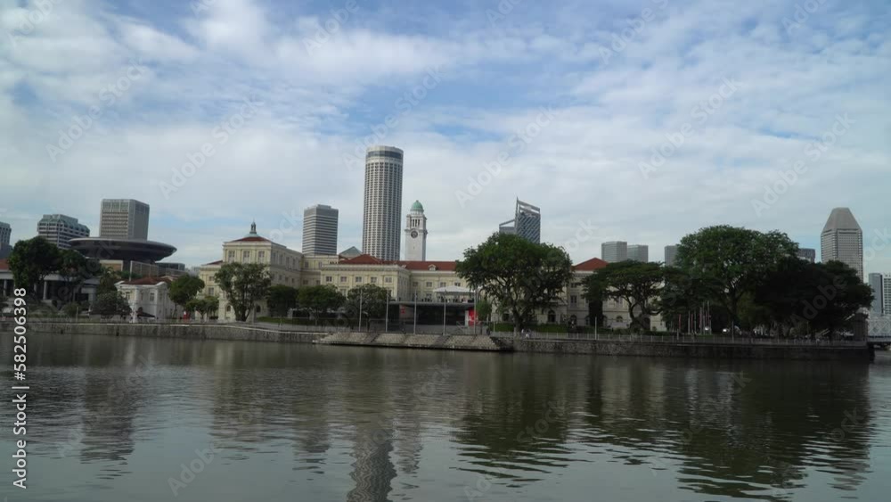 City buildings on the riverbank in Singapore. City buildings on the riverbank in Singapore.