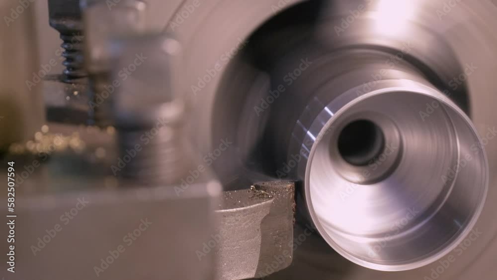 Lathe Milling Plant Metal Billet Cutting Machine with Shavings at Factory. Metalworking, industry, equipment, concept of production and metalworking. Heavy industry. Lathe Milling Plant Metal Billet Cutting Machine with Shavings at Factory. Metalworking, industry, equipment, concept of production and metalworking. Heavy industry.