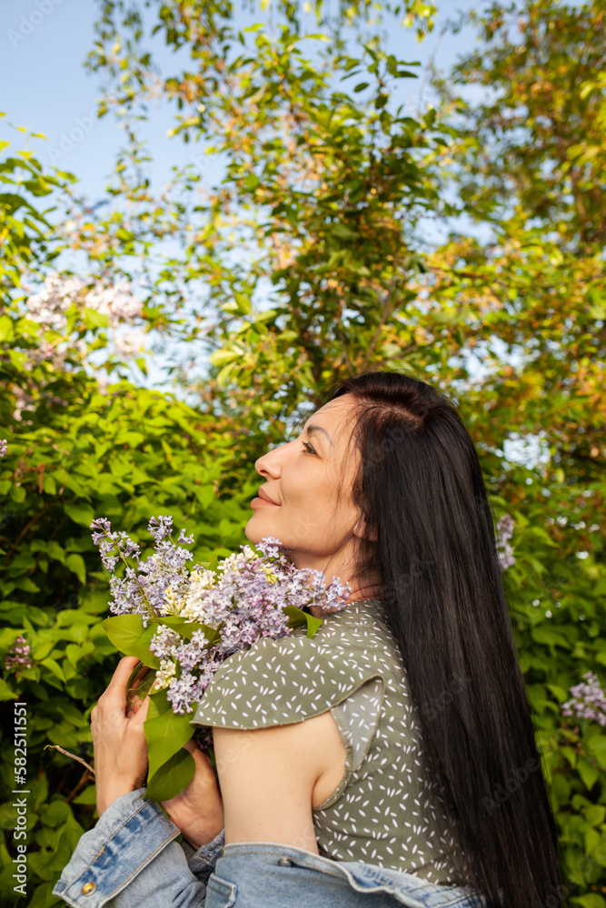 Facial close-up portrait of youthful female posing against green trees, smiling widely, feeling free, enjoying hot summer day. Facial close-up portrait of youthful female posing against green trees, smiling widely, feeling free, enjoying hot summer day.
