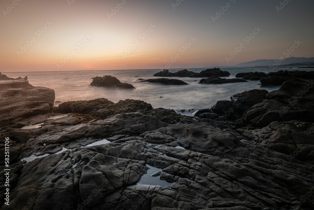 Landscape view of the sunset over the rocky seascape